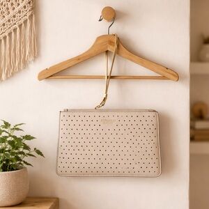 🛍️ Victoria's Secret Cream pinkish cut out Perforated zip Wristlet medium